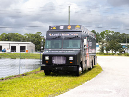 Front view of the Cousins Maine Lobster Food Truck built by Premier Food Trucks in Lubbock, Texas. A professional-grade unit for those looking to buy food trucks.