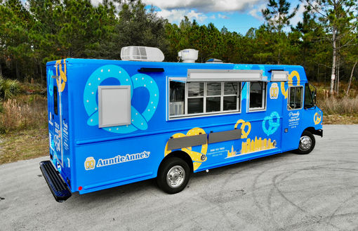 Exterior view of Auntie Anne's custom food truck, showcasing the sleek design and high-quality build perfect for those looking to buy a food truck.