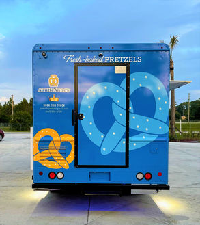Premier Food Trucks custom-built food truck for the renowned pretzel franchise, Auntie Anne's. Best food truck for sale.