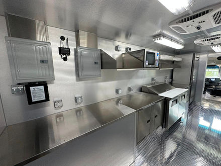 Interior view of the Retail Sports Marketing truck showcasing storage and equipment, built by Premier Food Trucks. Ideal for businesses looking for a food truck for sale.