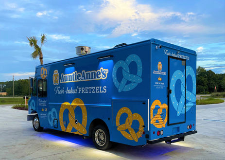Premier Food Trucks custom-built food truck for the renowned pretzel franchise, Auntie Anne's. Best food truck for sale.