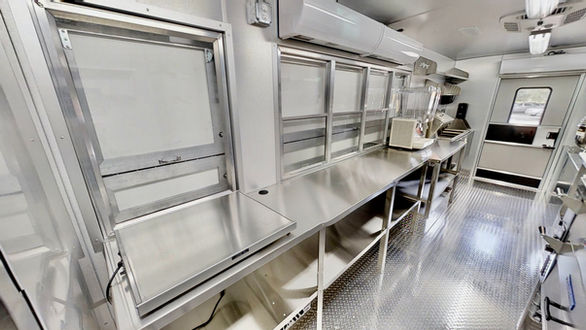 Comprehensive interior view of Auntie Anne's custom food truck, highlighting the top-quality build by Premier Food Trucks