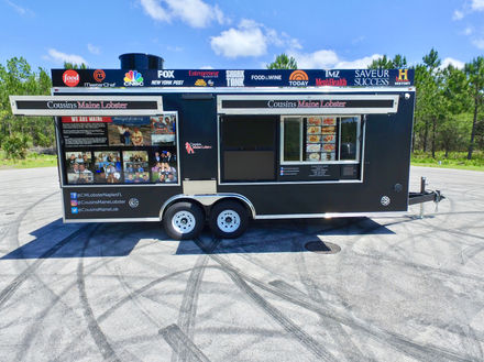 Full exterior view of the custom-built Cousins Maine Lobster trailer in Naples, Florida. Discover the best custom-built new food trucks for sale.