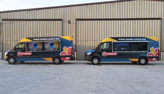 Vibrant vinyl wraps on Premier Food Trucks custom-built game trucks. Looking for food trucks for sale or to buy a food truck? Contact Premier Food Trucks, the best custom food truck builders in Florida.