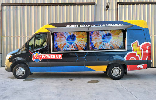 Samsung TV installed on a Premier Food Trucks custom game truck, built in Florida. Food truck builder offering fast food truck builds and custom gaming trucks.