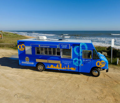Alternate angle of the serving window side of Auntie Anne's food truck built in Jacksonville, Florida. This is a prime example of our custom food truck craftsmanship.