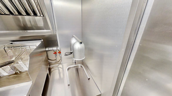 Commercial fryers inside Barcelos USA food truck, installed for high-efficiency cooking, perfect for those looking to build a food truck.
