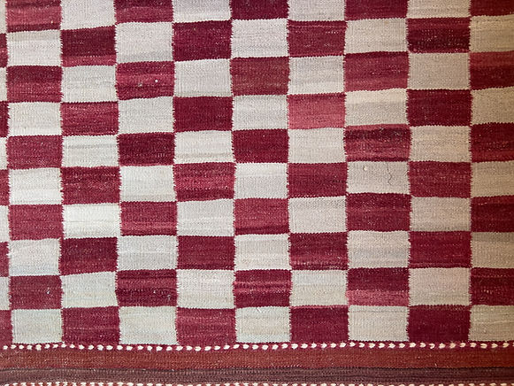 Julie stephenson _juliesstudiojourneys handwoven mat from Afghanistan using madde plant dye.
