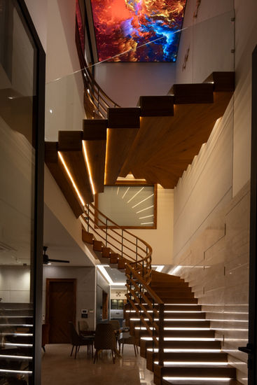a wooden staircase with lights on the steps