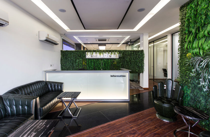 a office reception area with a sign that says riverdale 