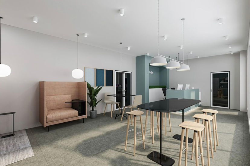 a room with a table and stools 