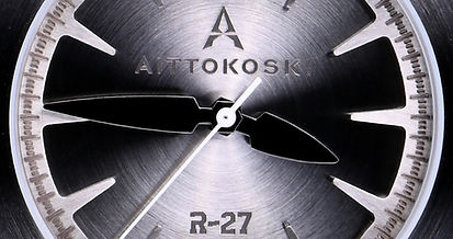 Aittokoski R-27 watch hand detail: hexagon motif repeated at hand centers.