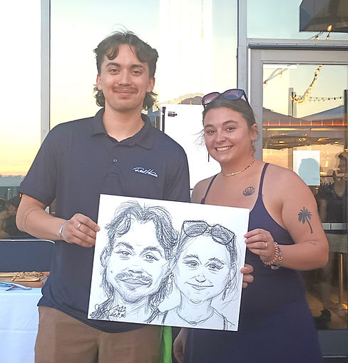 Corporate event guests enjoying live caricature entertainment by Boston Caricature Artists at a Boston event.