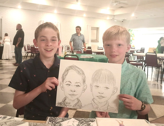Guests posing with caricatures at a graduation party.