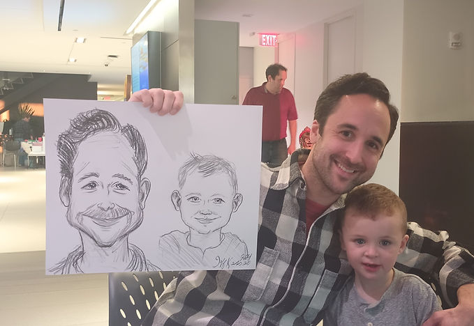 Wedding guests enjoying caricature entertainment during cocktail hour.