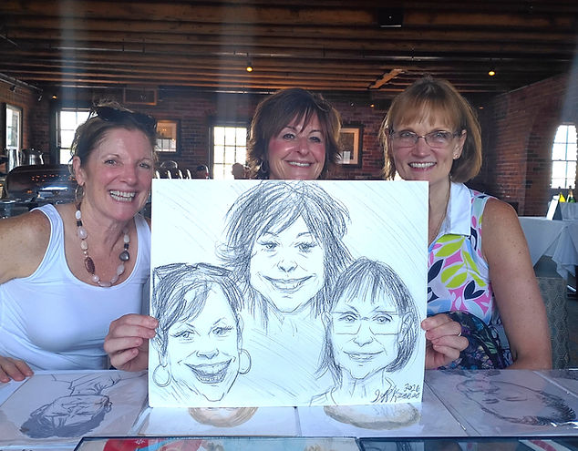 Three guests holding their finished group caricature drawing at an event served by Boston Caricature Artists in Wakefield, MA