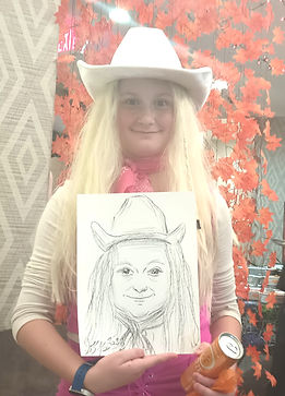 Live caricature artist entertaining students and families