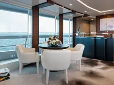 Additional al fresco dining setup on the bridge deck of the Heesen 50m.
