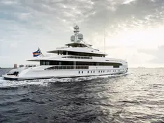 The Heesen 50m superyacht navigating along the Sardinian coast, showcasing its modern design.
