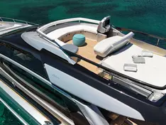 Relaxing sunpad area on the fly bridge deck of Riva Perseo 76