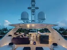 Night view of the Heesen 50m yacht with elegant exterior lighting at Porto Cervo.