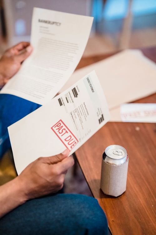 Past due notices and bankruptcy documents — representing the financial losses suffered by Dashdot clients