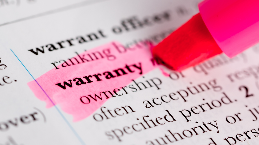 Close-up of a dictionary page with warranty highlighted in pink and a red marker, suggesting emphasis or study.