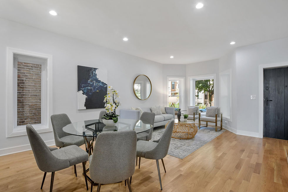 Spacious family and dining room with oak flooring.