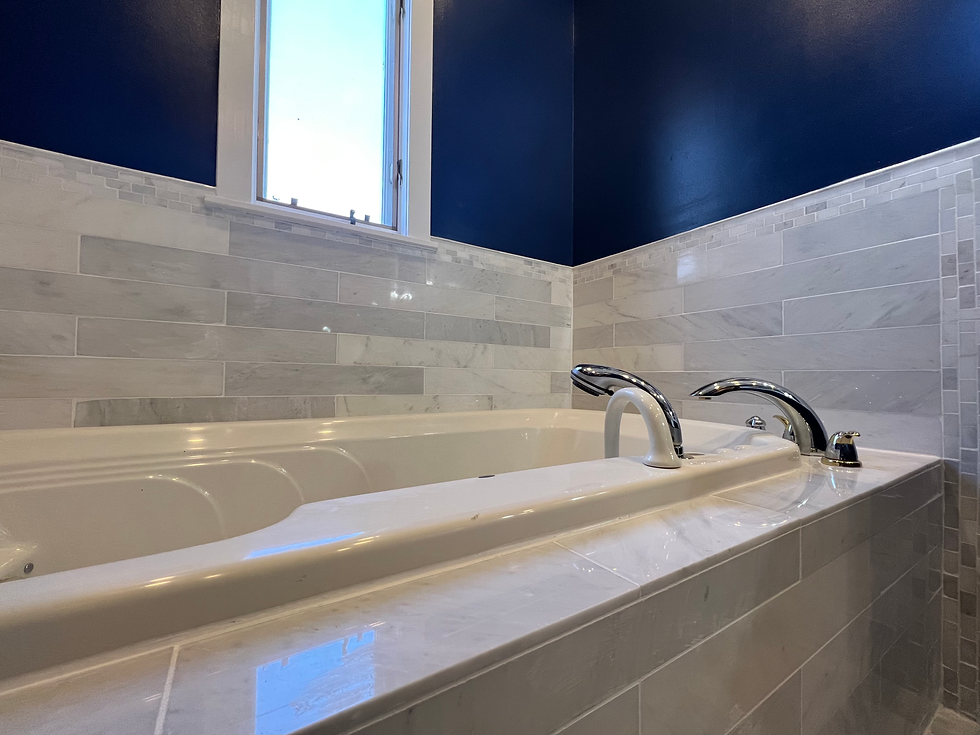 Full bathroom renovation with a brand new layout featuring a walk-in shower, luxurious bathtub. a fl