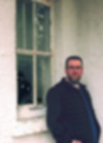 Mark S Gagne with his ink creatures in the window