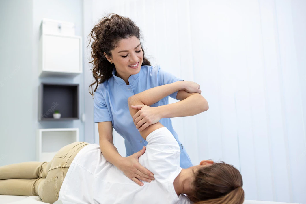 physiotherapist-treatment-patient-holding-patient-s-hand-shoulder-joint-treatment-physical