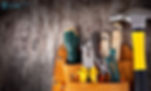 Tool belt with various tools like pliers, a hammer, and screwdrivers against a wooden background. Logo of Diversitech Global is visible.