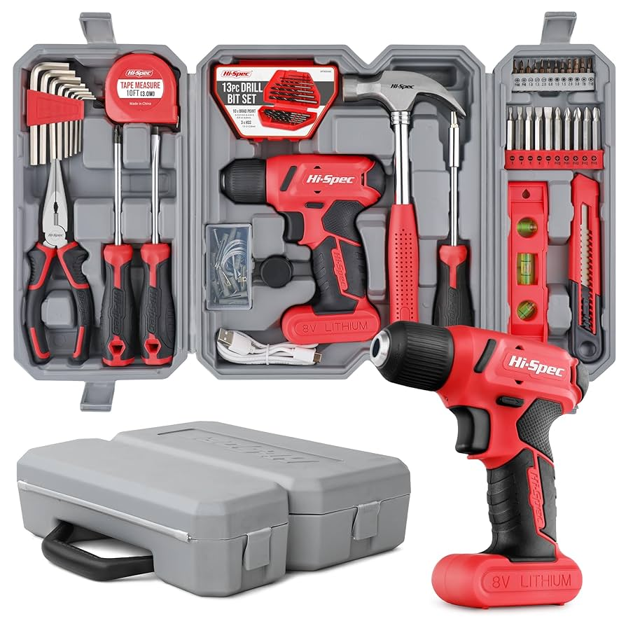 Tool set with red handles in open gray case. Includes drill, hammer, screwdrivers, bits, tape measure, and levels. Hi-Spec branding visible.