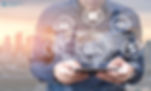 Man using a smartphone with digital finance icons overlaid. City skyline at sunset in background. Text: "DIVERSITECH GLOBAL" top left.