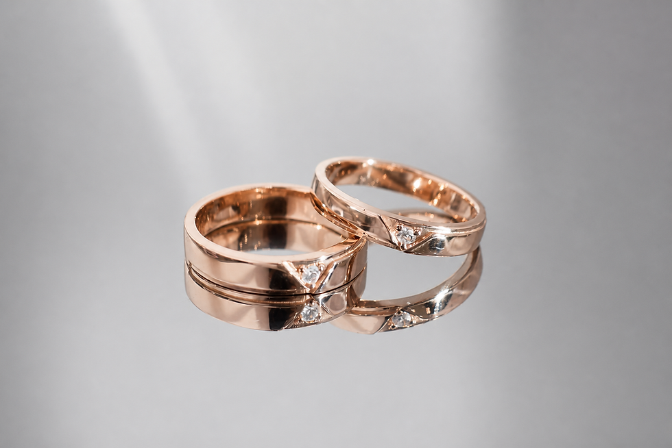 Rose gold Chevron Point lab diamond wedding band set displayed within branded jewellery ribbon