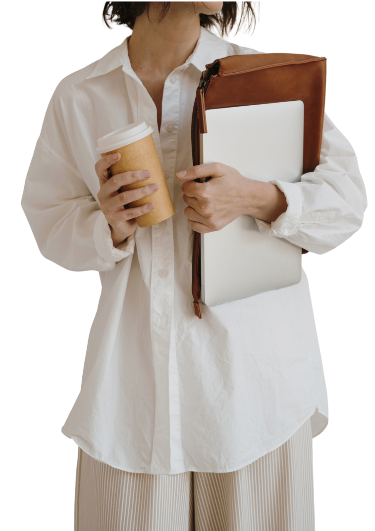 picture of a lady holding a Mac and a coffee