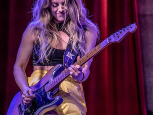The Strap as Style: Why Stage Presence Starts Before the First Note