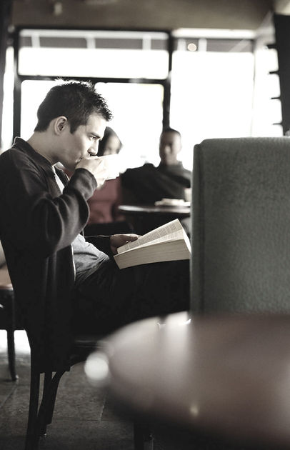 Man Sipping Coffee