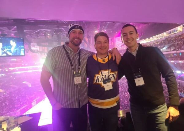 3 people at sports event