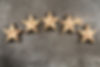 Five stars on dark background.jpg