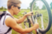 Cyclist doing bicycle repair
