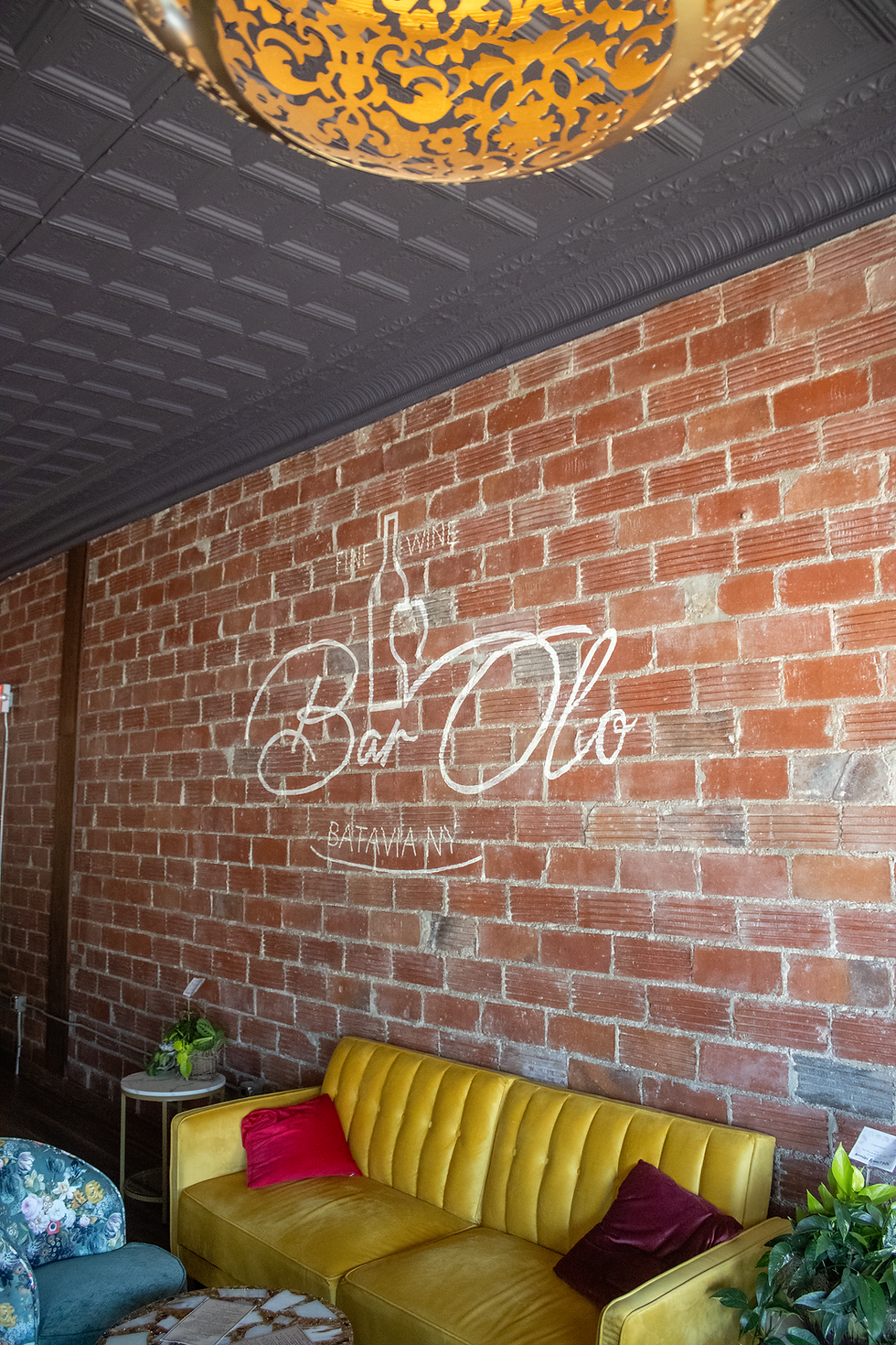 preserved brick wall at bar olo wine bar in downtown batavia ny