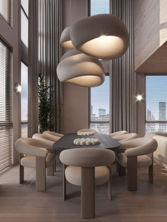 Nowoczesna jadalnia zaprojektowana przez architekta wnętrz w eleganckim, ponadczasowym stylu. Projekt wnętrza premium, minimalistyczna aranżacja, organiczne formy, designerskie oświetlenie i wysokiej jakości materiały. Architekt wnętrz Warszawa – Marika Kafar, autorskie projekty wnętrz mieszkalnych dopasowane do stylu życia klienta.