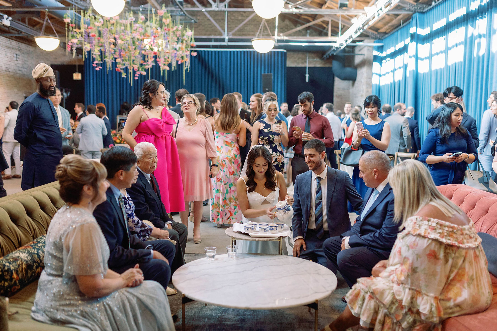 Newlyweds enjoy traditional tea ceremony.