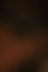 Romantic candlelit wedding reception tablescape in industrial Chicago loft venue.