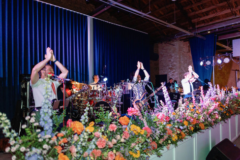 Rod Tuffcurls and The Benchpress perform at industrial wedding.