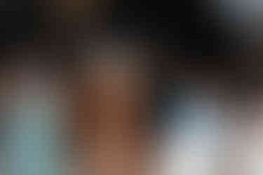 Bridal party makes bold entrance to wedding reception with bottles of tequila.