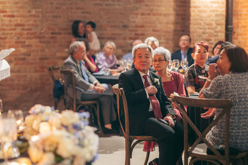 Guests enjoy seated dinner and speeches at moody dinner reception.