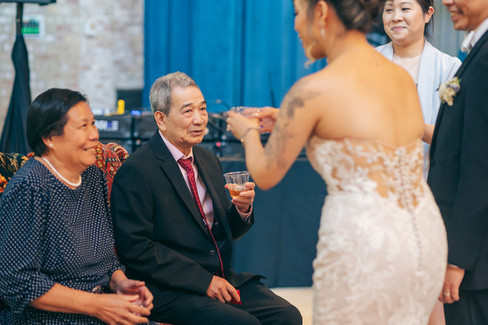 Bride and groom give tea to parents as sign of respect.