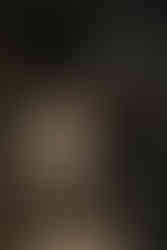 Bride and groom walking down staircase together during wedding reception at Wildman BT Chicago.